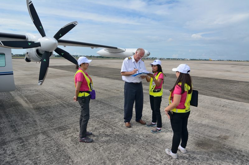 091213 Mike Laver completes departure paperwork in Philippines